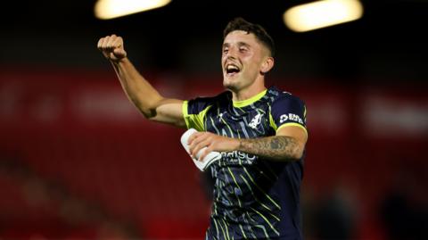 Reece Hutchinson celebrates scoring for Crewe Alexandra