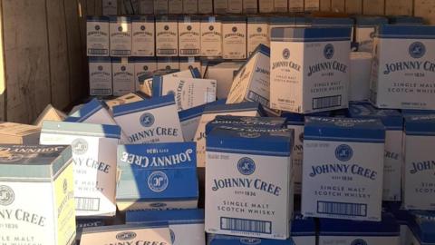 Boxes of Johnny Cree whisky found in back of lorry stopped on M606