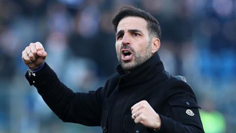 Cesc Fabregas celebrates