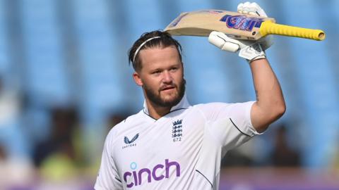 England opener Ben Duckett raises his bat after hitting a century