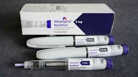 Collection of weight-loss jab paraphernalia and box, labelled "mounjaro kwikpen"
