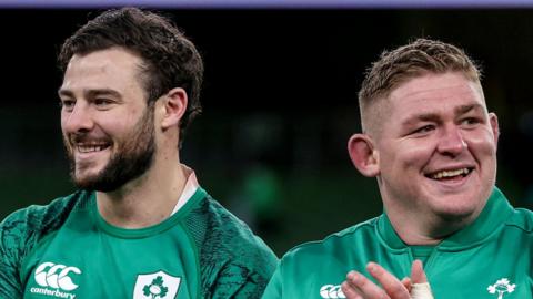 Robbie Henshaw and Tadhg Furlong applauding fans after defeating Argentina in Dublin