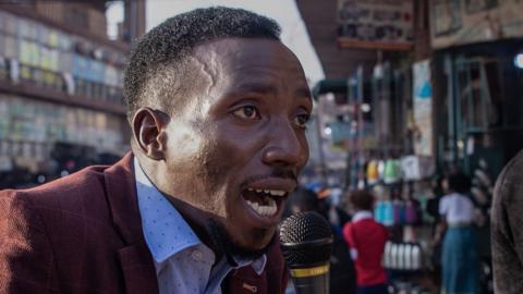 A man preaching on the street