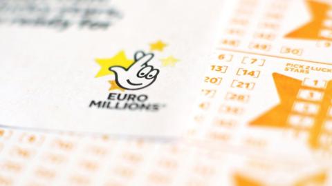 A close up of a EuroMillions ticket