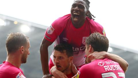 Huddersfield celebrate their first goal