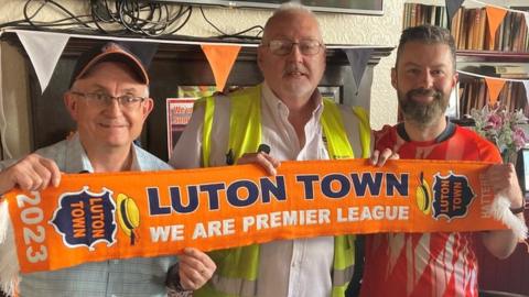 John Pyper (left), middle Tony Murray chairman of Luton Town Supporters Trust and Mike Fanning (right), at the Bricklayers Arms, Luton