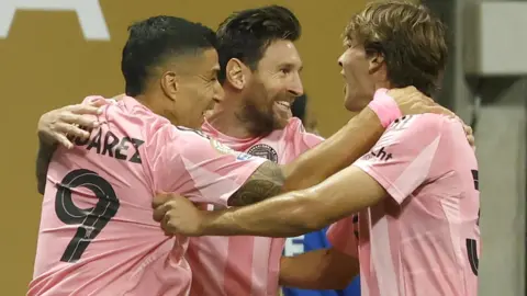 Lionel Messi celebrates