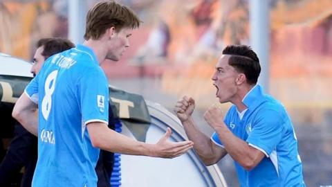 Giacomo Raspadori celebrates with Scott McTominay after scoring for Napoli against Lecce in Serie A