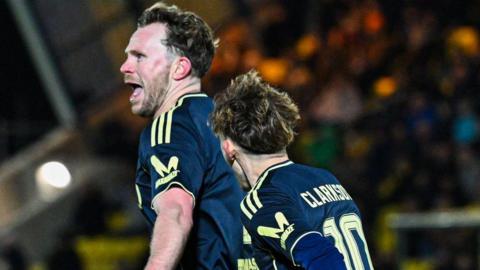 Aberdeen's Nicky Devlin celebrates scoring to make it 1-0 against Livingston