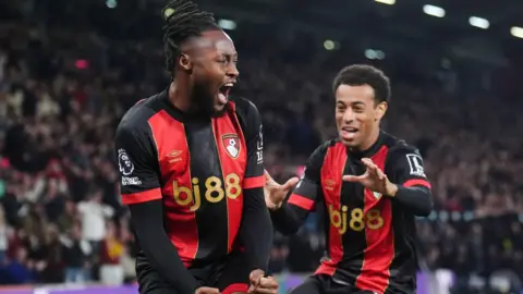 Antoine Semenyo and Tyler Adams celebrating against Fulham