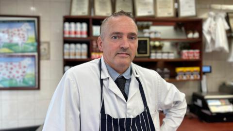 Chris Taylor pictured in his shop in Hucknall