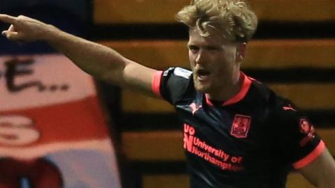 Cameron McGeehan celebrates scoring