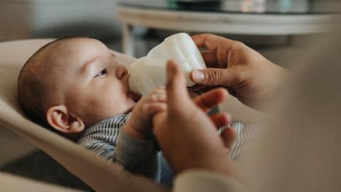 Baby drinking from a bottle