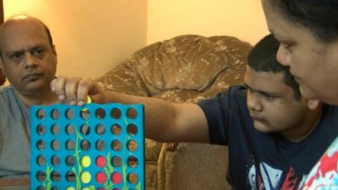 Anand family playing Connect 4