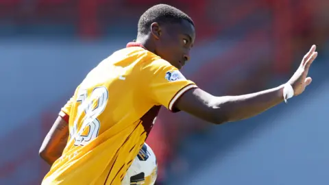 Tawanda Maswanhise celebrates scoring for Motherwell