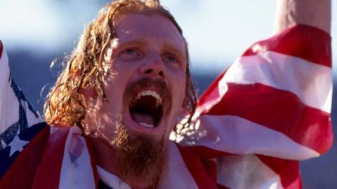 Alexi Lalas celebrates