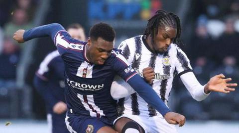  Dundee's Tony Yogane and St Mirren's Tunmise Sobowale