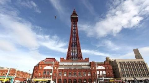 View of Blackpool Tower and the Tower buildings on the Promenade on a sunny day 