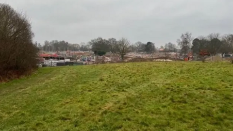 A photo within undeveloped golf course land where 70 new homes could be built, with a view towards the Emmer Green Drive development site off Kidmore End Road, Caversham.