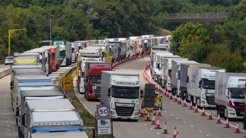 Lorries queuing during Operation Brock on the M20 near Ashford in Kent. Picture date: Saturday July 23, 2022.