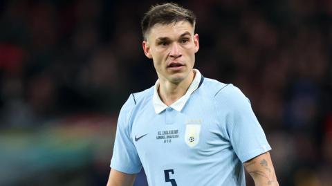 Manuel Ugarte in action for Uruguay
