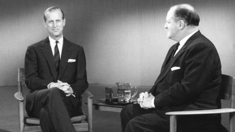 Prince Philip sits beside Richard Dimbleby.