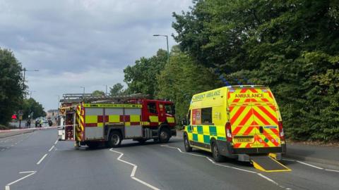 A fire engine and ambulance in Daleside Road East