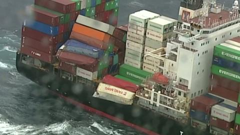 Containers balance off a Taiwanese-owned ship in the Tasman Sea near New South Wales, Australia on 2 June 2018.