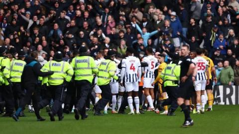 The Black Country Derby had to be suspended for 38 minutes because of the crowd trouble in the Halfords Lanes Stand, which fanned out onto the pitch