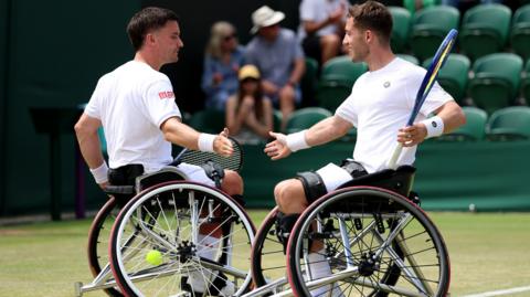 Alfie Hewett and Gordon Reid celebrate a point