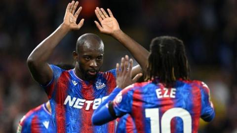 Jean-Philippe Mateta celebrates with Eberechi Eze after scoring for Crystal Palace against Norwich City in the EFL Cup