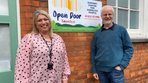 Emma Busby and Andrew Davis outside Open Door