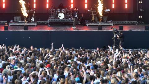 Crowds of fans in front of a stage during last year's Radio 1's Big Weekend festival.