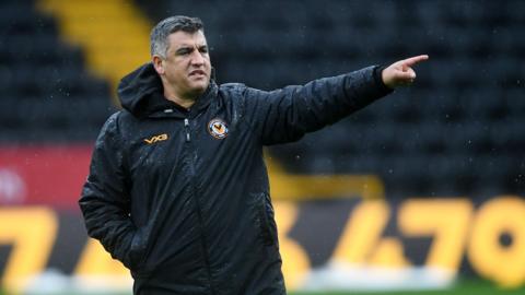 Nelson Jardim gives instructions to his players at Meadow Lane