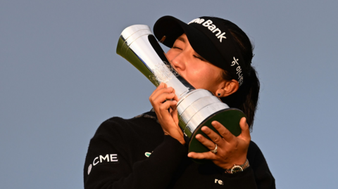 Lydia Ko kisses the AIG Women's Open trophy