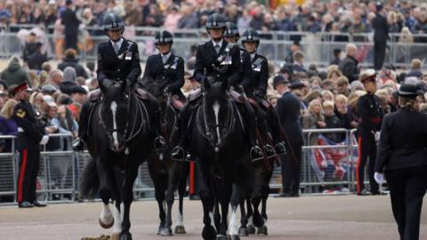 Officers on horseback for Monday's funeral