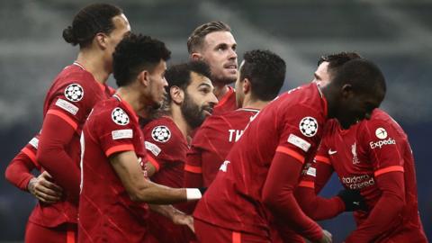 Liverpool's players celebrate scoring against Inter Milan in the Champions League