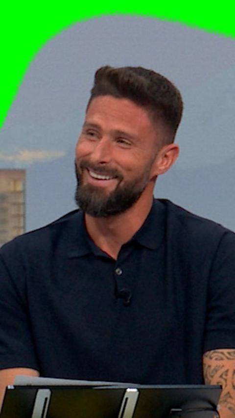 Olivier Giroud smiles during conversation
