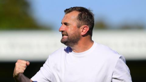 Paul Wotton punching the air