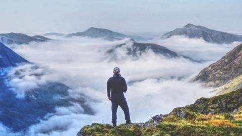 Alan O'Connor on Aonach Eagach Ridge, Glen Coe, during a cloud inversion