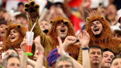 England fans wearing lion fancy dress costumes show their support during the FIFA World Cup 2026 Group L match between England and Croatia at Dallas Stadium on June 17, 2026 in Dallas, Texas. 