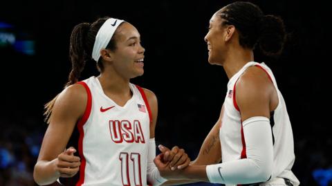 Napheesa Collier and A'ja Wilson celebrate during the USA's basketball win over Australia
