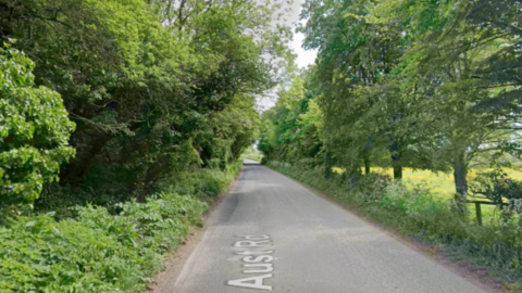 A google street view of the rural road where the collision happened, it is surrounded by trees and fields
