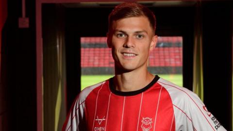 Erik Ring in the tunnel at Sincil Bank