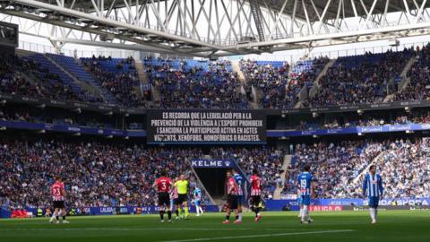 The big screen at Espanyol's stadium showing an anti-racism message.