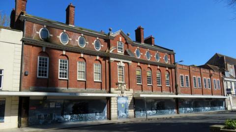 A red brick building.