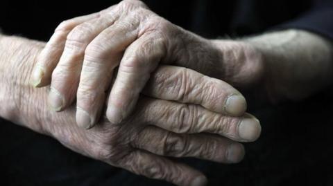 Elderly man's hands