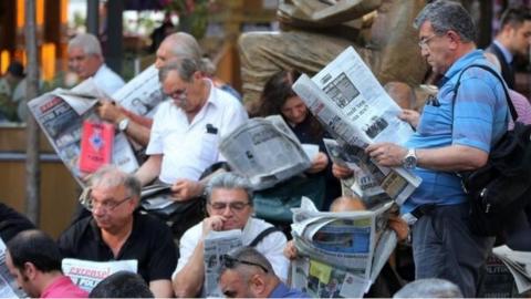 People read newspapers in Turkey. File photo