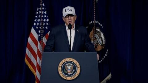 Donald Trump pictured delivering his address 