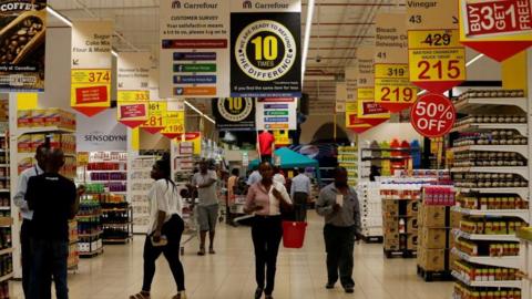 Customers walk inside the Carrefour hypermarket at the Two Rivers Shopping Mall in Nairobi, Kenya April 8, 2019. Picture taken April 8, 2019.